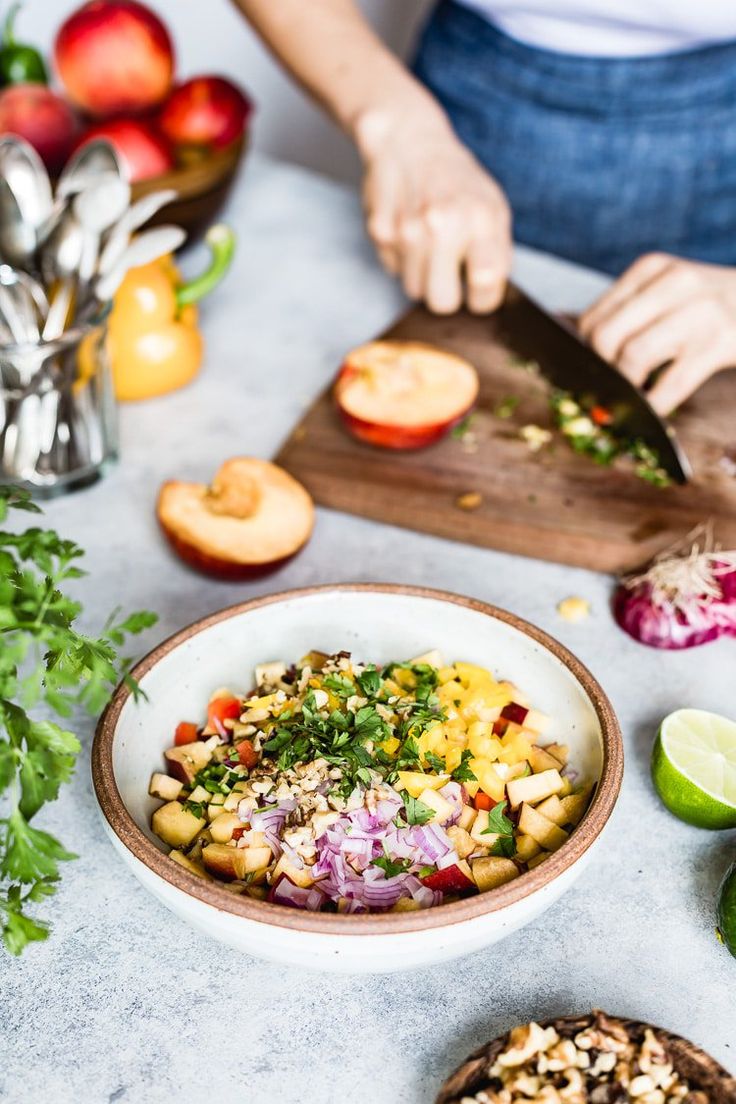 preparation of salad from vegetables and fruits